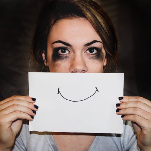 depression symptoms smiling woman